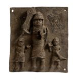 Two Benin style bronze relief plaques, depicting a pair of acrobats in a tree and the other with