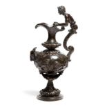 A Renaissance revival bronze ewer, with a satyr handle, the body decorated with panels of birds