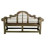 After a design by Sir Edwin Lutyens. A pair of teak 'Sissinghurst' garden benches by Barlow Tyrie,