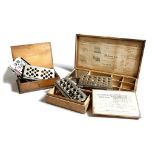 An Edwardian cachet maker set by S. Maw Son & Sons, London, the lid with a printed label