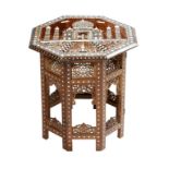 λ An Anglo-Indian hardwood octagonal occasional table, the lift-off top inlaid with ivory, bone,