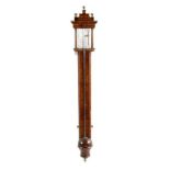 An early 18th century walnut stick barometer in the manner of John Patrick, the architectural top