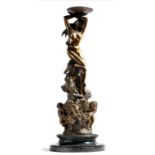 Giuseppe Beneduce (Italian). A bronze figure of a naked maiden holding a shell, standing on a