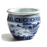 A Chinese blue and white jardinière, decorated with figures in a watery mountainous landscape,