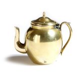 A late Victorian novelty brass inkwell in the form of a teapot, the hinged lid revealing a glass