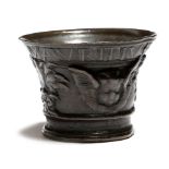 A 16th century Dutch dated bronze mortar, the rim inscribed 'MAURITIV'