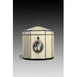 λ A George III ivory decagonal tea caddy, inlaid with tortoiseshell stringing, the tent hinged top