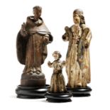 Three 17th century Hispano-Philippine carved wood saints, with traces of polychrome decoration and