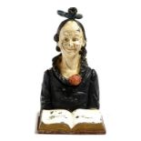 A cold painted metal inkwell modelled as the famous music hall comedian Dan Leno, as a pantomime