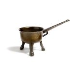 An Elizabeth I bronze skillet by Thomas Hatch of Broomfield, the handle with a 'T H' monogram, on