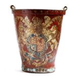 A 19th century red leather fire bucket, the body emblazoned with the Royal Coat of Arms (handle