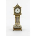 A Dutch silver timepiece, 1899, modelled as a long case clock, foliate scroll decoration, enamel