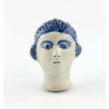 A rare pearlware bonbonniθre, c.1770, modelled as the head of a lady wearing a close-fitting