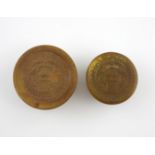 Two early 19th century Portuguese pressed horn snuff boxes, circular form, the covers with a