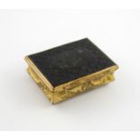 λAn 18th century gilt metal and tortoiseshell snuff box, with an enamel panel, rectangular bombè