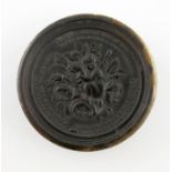A 19th century pressed horn snuff box, signed W. Wilson. J, circular form, the pull-off cover with a