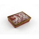 A French enamel rectangular snuff box, 19th century, decorated in the pβte sur pβte manner with