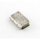 A 19th century silver snuff box, unmarked, book form, hinged cover, engraved foliate decoration,