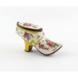 A Birmingham enamel snuff box, c.1760-70, modelled as a lady's shoe, brightly painted with