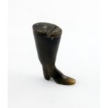 A Victorian novelty horn snuff box, modelled as a boot, the hinged cover with a base metal