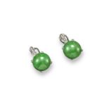 A pair of jade and diamond earrings, the circular jade cabochons are set beneath a line of