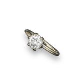 A diamond solitaire ring, the circular-cut diamond weighs approximately 1.02cts and is set in
