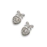 A pair of diamond set white gold heart-shaped drop earrings, the hearts are pierced with foliate