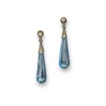 A pair of aquamarine and diamond drop earrings, the briolette-shaped aquamarines suspend from two