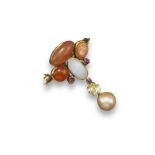 An Arts and Crafts gem-set gold brooch, set with a cluster of fire opal cabochons, a white opal,