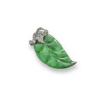 A jade and diamond brooch, the carved jade leaf is set with graduated circular-cut diamonds to the