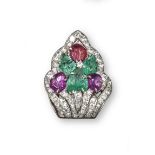 An Art Deco tutti fruitti stylised palm design clip brooch, set with three carved emeralds and three