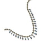 A moonstone necklace, designed as a line of graduated circular-cut moonstones, the centre section