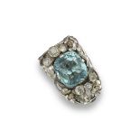 An aquamarine and diamond set Arts and Crafts style clip brooch, the cushion-shaped aquamarine is