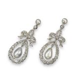 A pair of late Victorian natural pearl and diamond drop earrings, the small button-shaped pearls