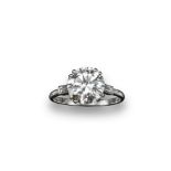 A diamond solitaire ring, the round brilliant cut diamond weighs approximately 3.03cts and is set