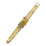 A gentleman's gold wristwatch by Longines, the signed rectangular dial with baton numerals, manual