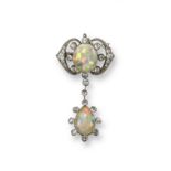 An Edwardian opal and diamond brooch pendant, the upper section set with an oval-shaped crystal opal