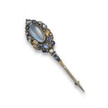 A gem-set brooch attributed to Dorrie Nossiter, set with a central moonstone cabochon amongst