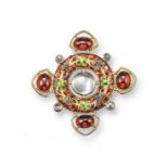 A garnet and moonstone mounted gold Arts and Crafts brooch by James Cromar Watt