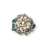 A foliate cluster ring by Shreve, set in platinum with yellow and white circular and baguette-shaped