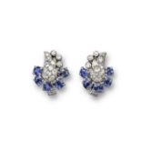 A pair of sapphire and diamond earrings by Cartier, the stylised fritillary flowers are pave-set