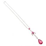 A pink tourmaline and diamond pendant, the pear-shaped pink tourmaline suspends from an
