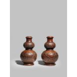 A RARE PAIR OF CHINESE IMPERIAL HARDWOOD GOURD-SHAPED VASES, HULUPING QIANLONG 1736-95 Probably from