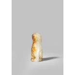 A CHINESE PALE CELADON JADE MODEL OF A QILIN QING DYNASTY OR LATER Sitting on its haunches with a