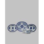 A CHINESE TUREEN AND COVER AND THREE FITZHUGH PATTERN DISHES 18TH CENTURY The body and cover of