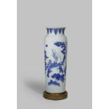 A LARGE CHINESE BLUE AND WHITE 'SLEEVE' VASE TRANSITIONAL C.1640 The cylindrical body painted with a