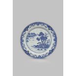 A LARGE CHINESE BLUE AND WHITE DISH MID 18TH CENTURY Painted with two figures in small boats and a