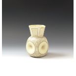A Thomas Webb & Son Ivory Cameo glass vase c.1880, the dimpled four-sided body rising to a hexagonal