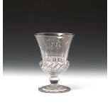 A large glass rummer dated 1830, of campana shape, the flared bowl moulded with spiral gadroons