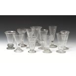Eleven jelly glasses 18th century, of varying form, with spiral, ribbed and honeycomb moulding,